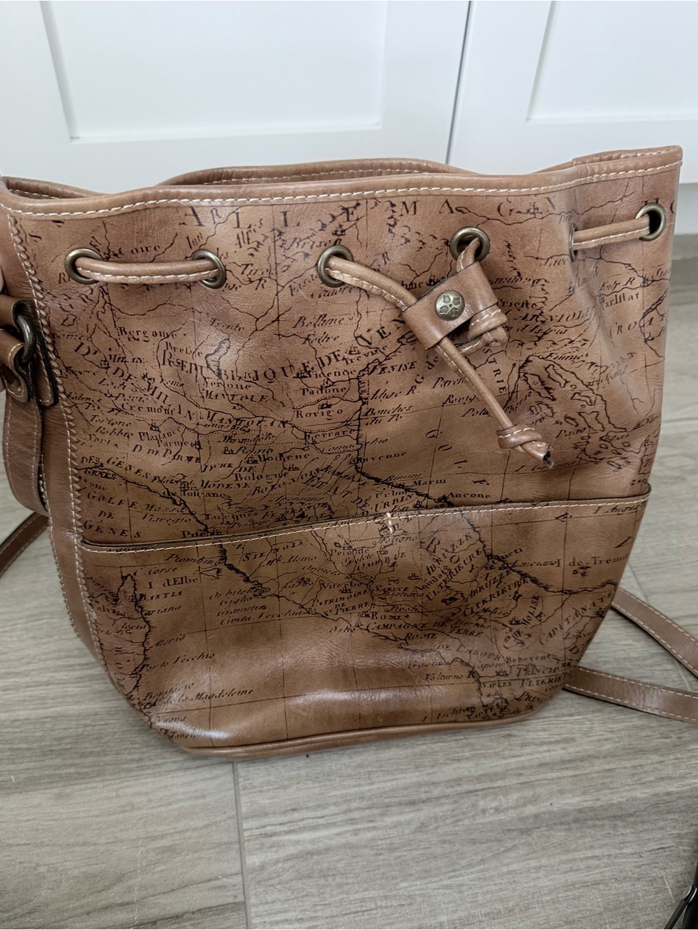 Patricia Nash Tan Leather Drawstring Bucket Bag with Map Print